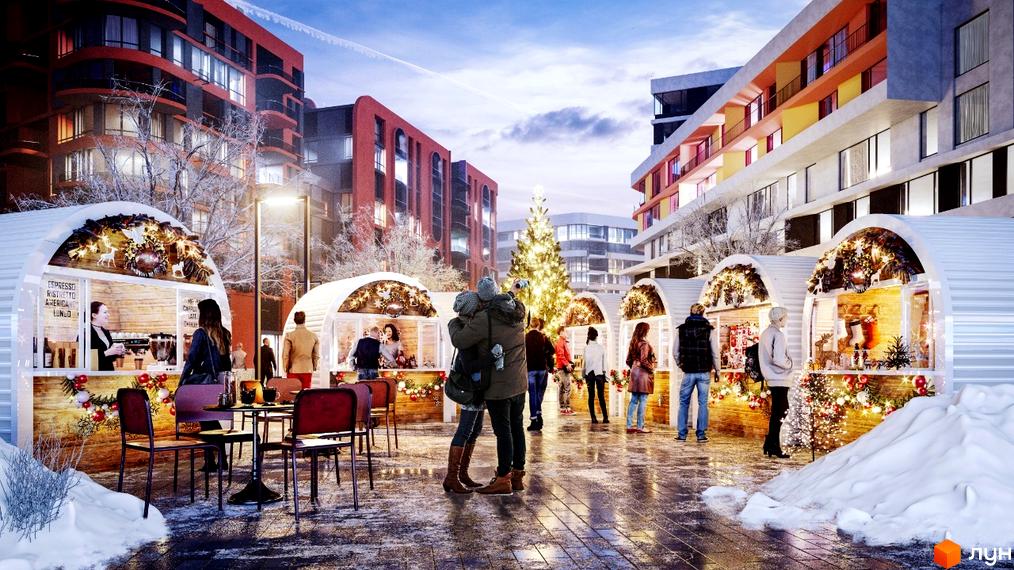 Житловий комплекс Respublika взимку. На зображенні видно багатоповерхові будинки з червоними та світлими фасадами, а також різдвяний ярмарок з прикрашеними кіосками та ялинкою.