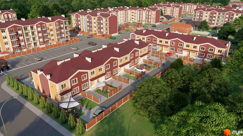 Таунхауси Амстердам з червоними дахами та жовто-червоними фасадами, з прибудинковою територією, паркінгом та зеленими насадженнями.