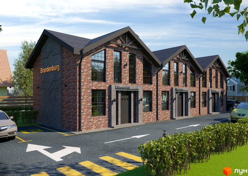 Таунхауси Brandenburg з червоної цегли під сірим дахом, з великими вікнами, на тлі блакитного неба та зелених дерев. Перед будинками асфальтована дорога з розміткою та зелені кущі.