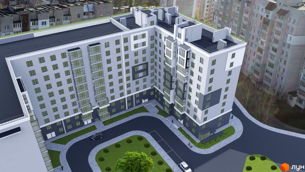 Зовнішній вигляд новобудови ЖК Авіатор з сірими фасадами та скляними балконами, прибудинкова територія з дорогою та зеленими насадженнями.