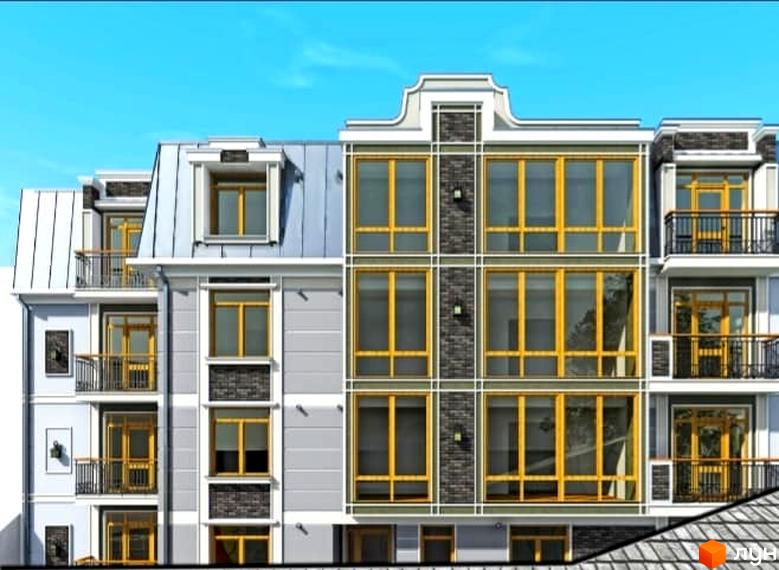 Фасад житлового комплексу Елітний з великими вікнами та балконами. Сучасна архітектура новобудови.