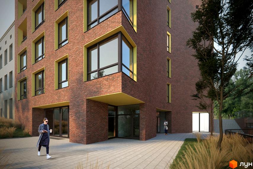 Зовнішній вигляд новобудови ЖК Там Де Дім з червоної цегли з жовтими акцентами. Прибудинкова територія з бруківкою та зеленими насадженнями.