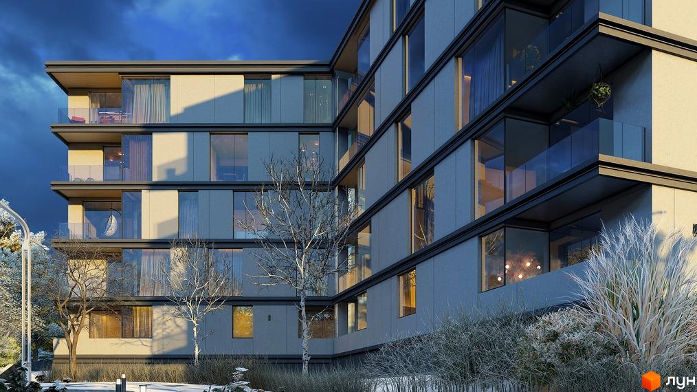 Зовнішній вигляд новобудови на вул. Мечникова з балконами та великими вікнами. Прибудинкова територія з деревами та снігом.