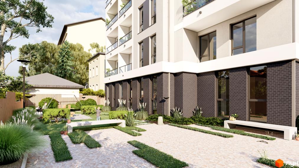 Житловий комплекс На Кондукторській: фасад будівлі з темною цегляною кладкою та великими вікнами, прибудинкова територія з ландшафтним дизайном та зонами відпочинку.