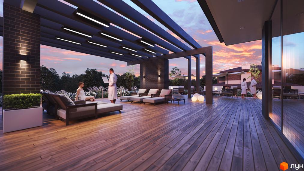 КМ Franko River Club: затишна тераса з шезлонгами та зонами відпочинку під навісом, що виходить на зелену територію з деревами та квітами. Відкритий простір для релаксації.