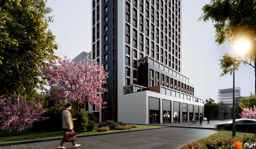 Житловий комплекс West Hall - це сучасна новобудова з елегантною фасадною обробкою та зеленою прибудинковою територією з квітучими деревами.