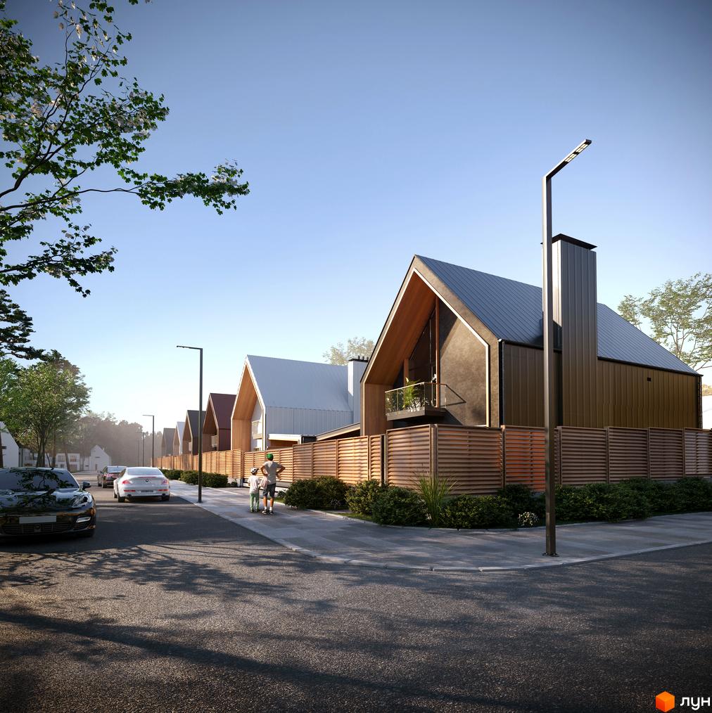 Котеджне містечко КМ Comfort Life Villas з сучасними будинками та доглянутою прибудинковою територією. Територія комплексу огороджена дерев'яним парканом.