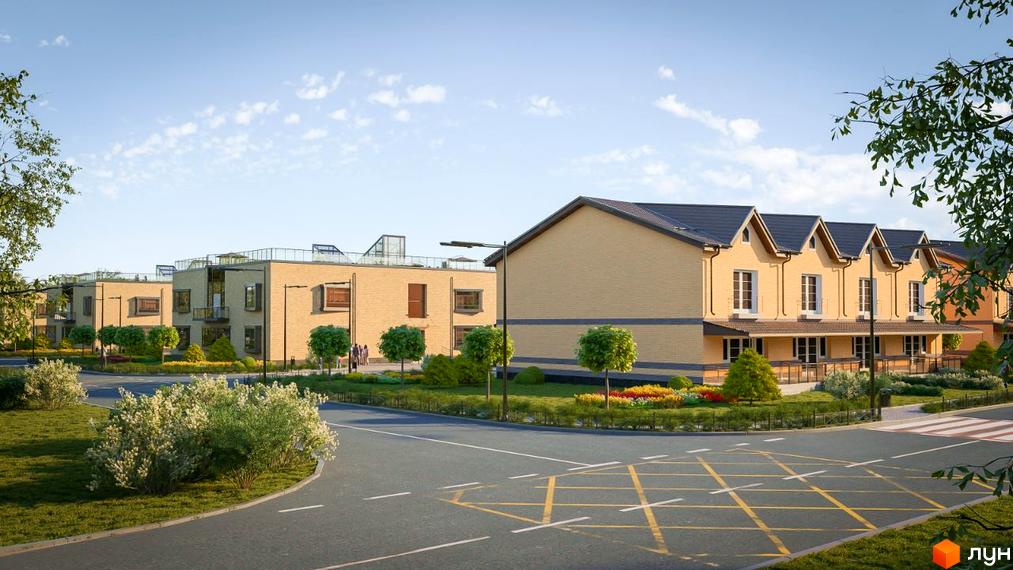 Житловий комплекс Європейський квартал: будинки з бежевої цегли та темними дахами, розташовані серед зелених газонів, дерев та яскравих квітників.