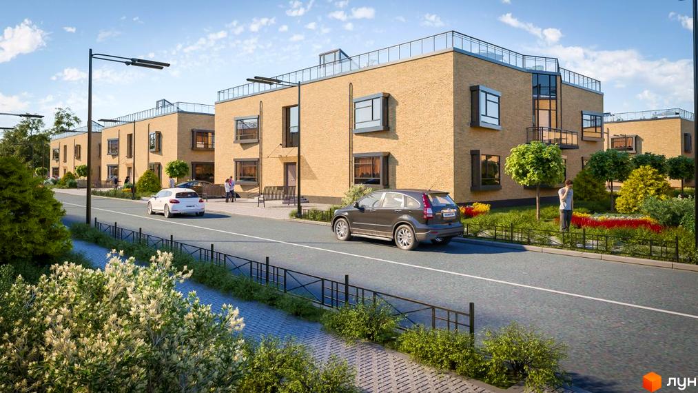 Житловий комплекс Європейський квартал з жовтої цегли та доглянутою прибудинковою територією з деревами та квітами.