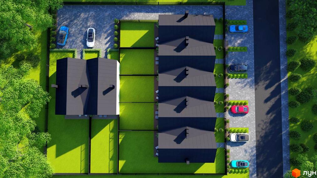 Вигляд зверху на Котеджне містечко Villa Gatne з будинками з темними дахами та зеленими газонами. Поруч розташована парковка для автомобілів.