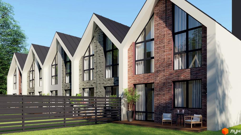 Зображення будинків Котеджного містечка Villa Gatne з великими вікнами та терасою. Навколо будинків зелений газон та декоративна огорожа.