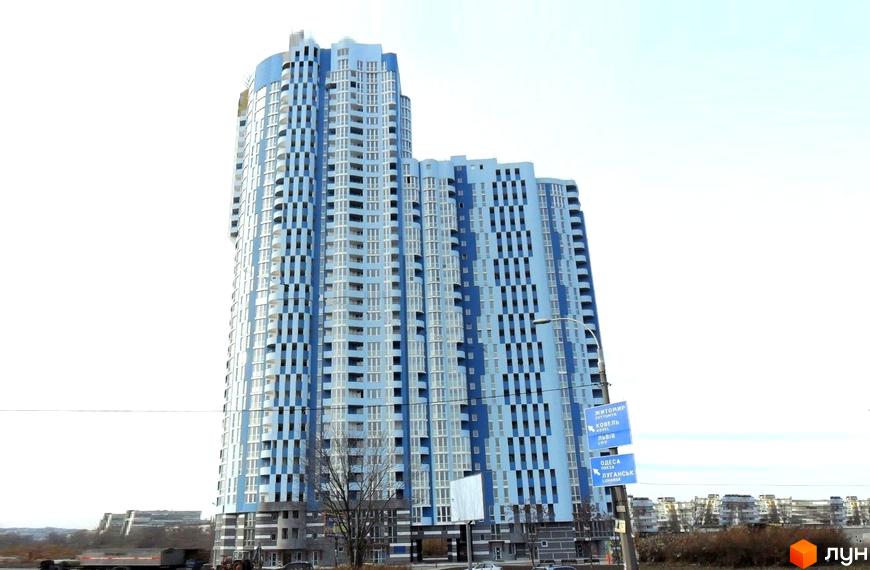 Житловий комплекс Київська Венеція з сучасною архітектурою та просторою прибудинковою територією.