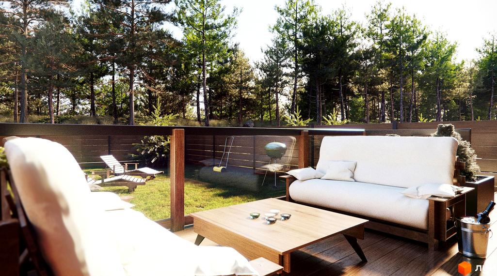 Зображення тераси з меблями в Котеджному містечку Джерело. На задньому плані дерева та зелений газон.