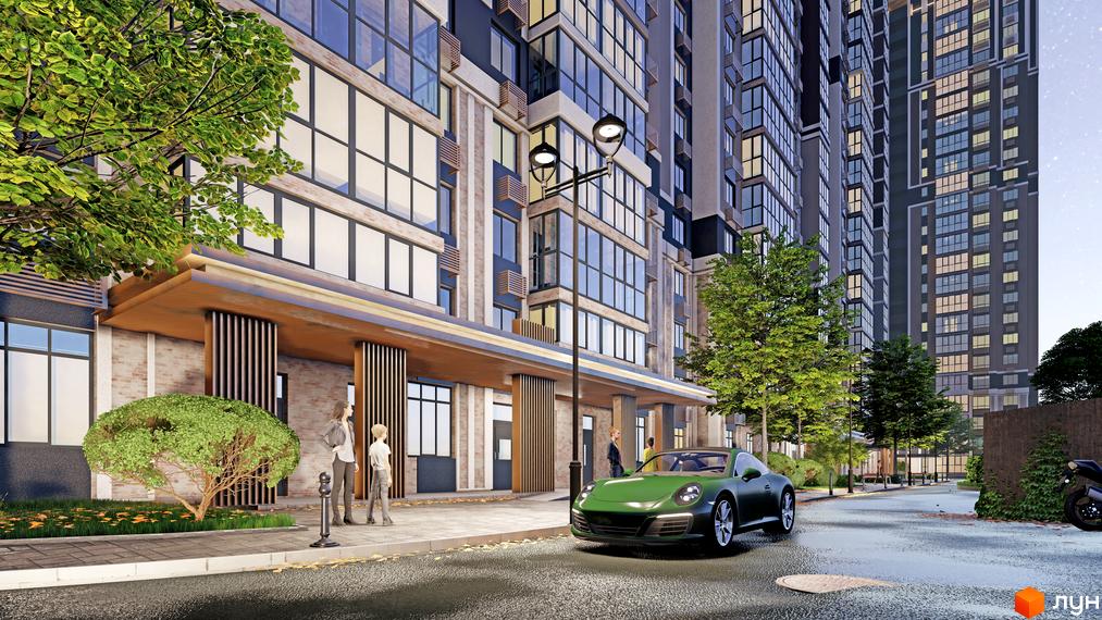 Зовнішній вигляд житлового комплексу Голосіївський з фасадами з цегли та скла, зеленою зоною та автомобілем біля входу.