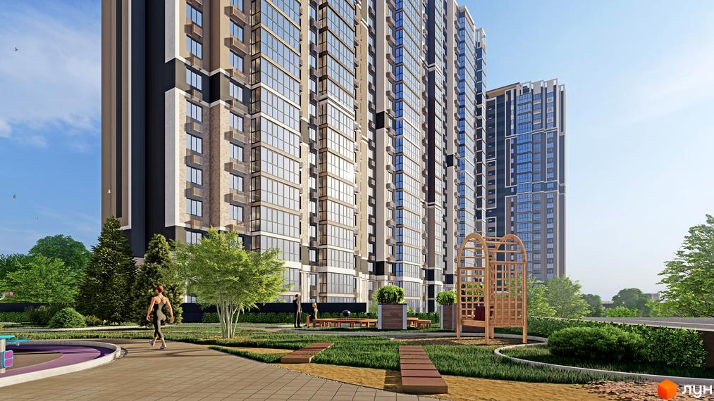 Зовнішній вигляд ЖК Голосіївський з сучасним фасадом та прибудинковою територією з зеленими насадженнями та місцями для відпочинку.