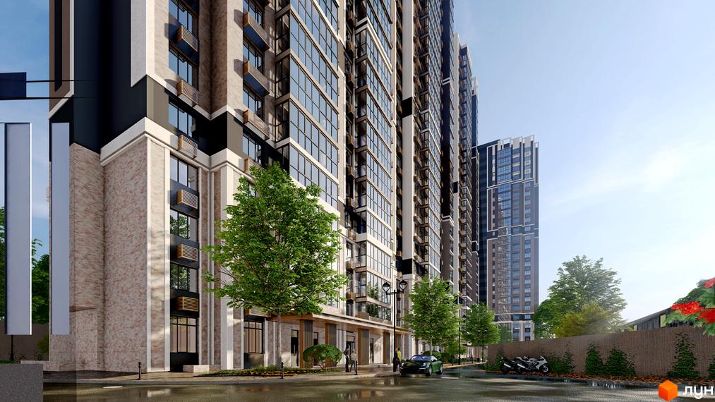 Житловий комплекс Голосіївський: фасади будівель з панорамними вікнами, зелені дерева та доглянута прибудинкова територія.