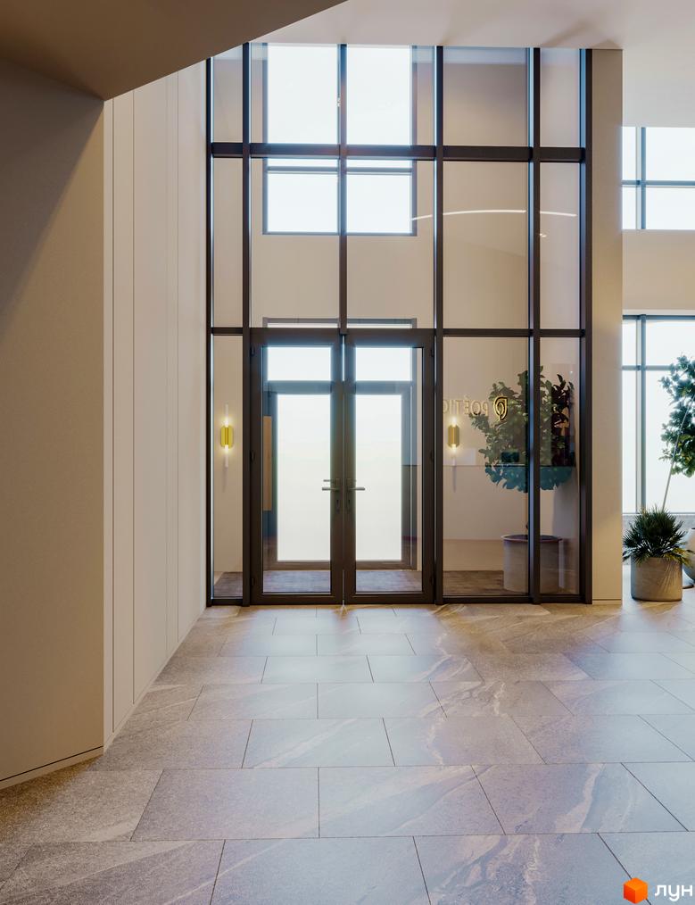Вхід до Житлового комплексу Poetica. Перша колекція зі скляними дверима, високими вікнами та світлою плиткою на підлозі.