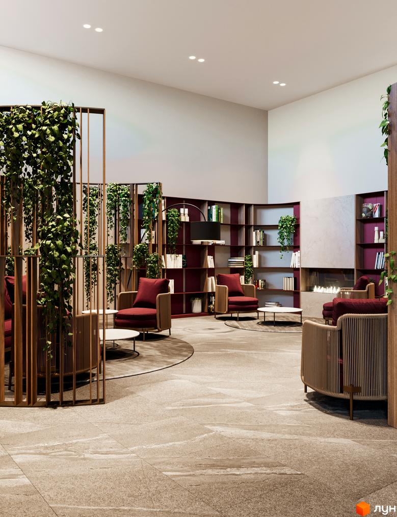 Інтер'єр кімнати відпочинку в Житловому комплексі Poetica. Перша колекція. Зручні крісла та полиці з книгами створюють затишну атмосферу.