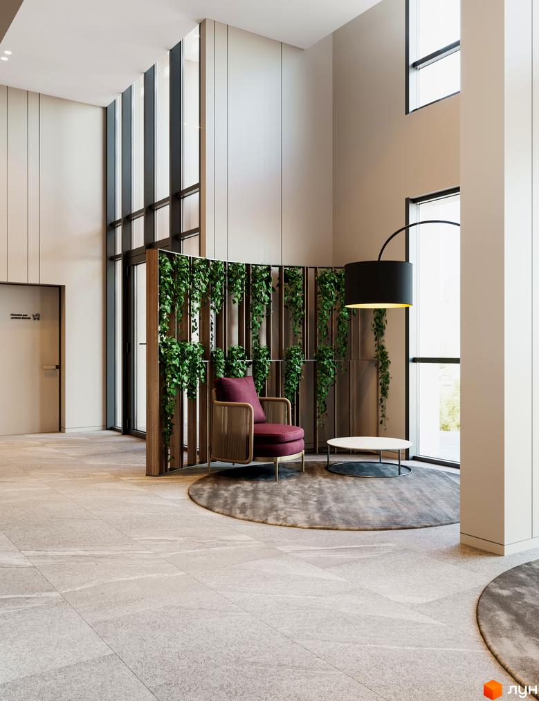 Просторий вестибюль Житлового комплексу Poetica. Перша колекція з високими стелями, панорамними вікнами та зоною відпочинку з зеленими рослинами.