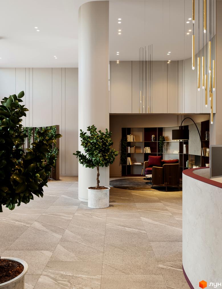 Інтер'єр холу в Житловому комплексі Poetica. Перша колекція. Колона, зелені рослини у вазонах, зона відпочинку з меблями та книжковими полицями.