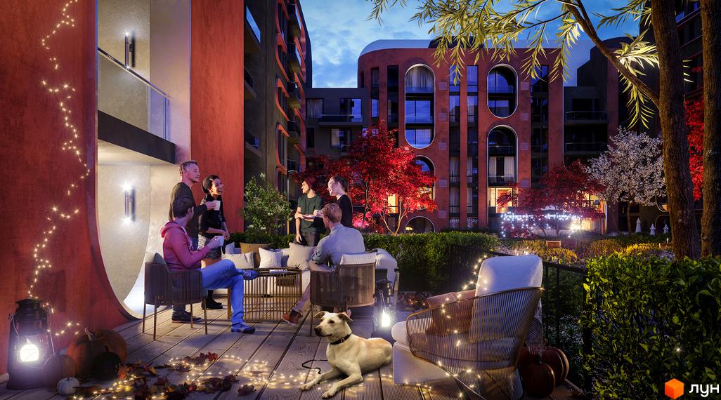 Житловий комплекс Respublika з фасадами цегляного кольору та арковими вікнами. На терасі люди відпочивають серед осіннього декору та гірлянд.
