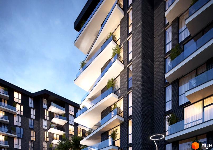 Зовнішній вигляд Житлового комплексу Artynov Hall: темні багатоповерхові будинки з білими балконами та скляними поручнями. На балконах розміщені зелені рослини.