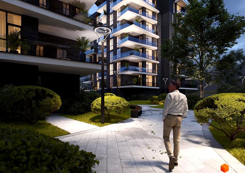 Багатоповерховий будинок Житлового комплексу Artynov Hall з темним фасадом та скляними балконами, оточений доріжками, зеленими насадженнями та освітленням.