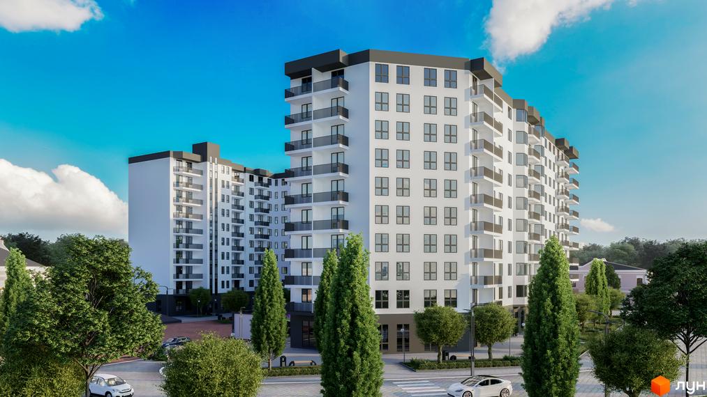 Новобудова ЖК Олексіївський з білими фасадами та балконами. Навколо будинку зелені дерева та доглянута територія.