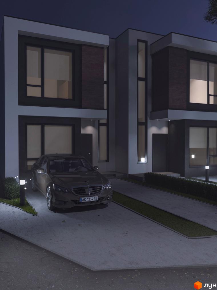 Зображення таунхаусів „На Вишневій“ вночі. Двоповерхові будинки з великими вікнами та підсвіткою, перед будинком припаркований автомобіль.