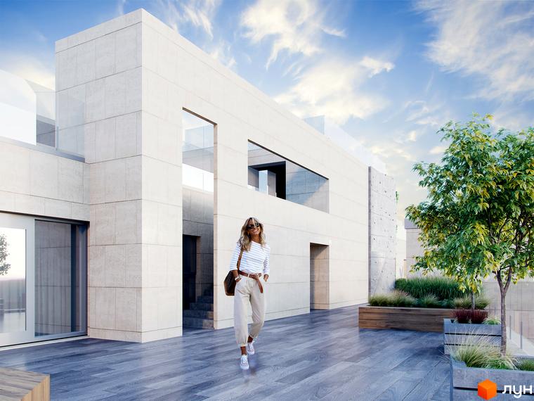 Фасад Житлового комплексу Krauss Gallery з білих блоків та великими вікнами. Прибудинкова територія має дерев'яне покриття, дерева та зелені насадження.