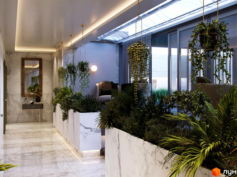 Світлий інтер'єрний простір Житлового комплексу Krauss Gallery з мармуровою підлогою, стінами та великими рослинними композиціями.