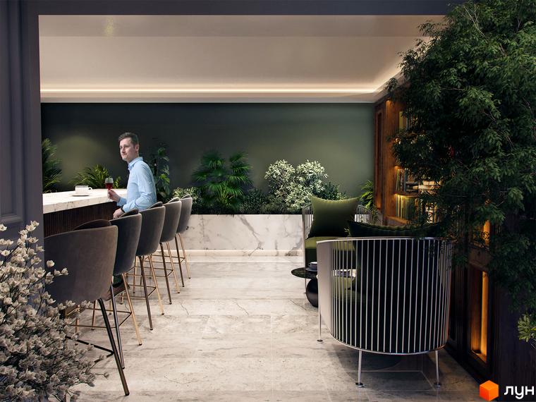 Інтер'єр тераси у Будівельному проєкті Krauss Gallery. Чоловік сидить за барною стійкою, поруч зелені рослини та стильні меблі.