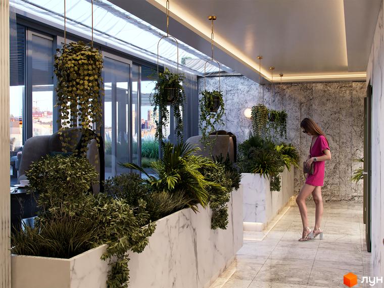 Житловий комплекс Krauss Gallery: світла галерея з панорамними вікнами, оздоблена мармуром та живими рослинами. З вікон відкривається міський краєвид.