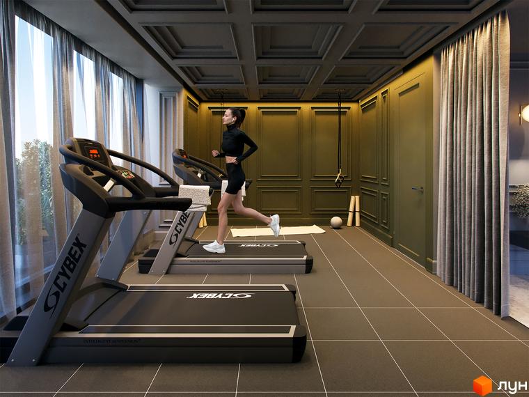 Зображення фітнес-залу в Житловому комплексі Krauss Gallery з тренажерами та жінкою, що займається спортом. Інтер'єр залу з сірими стінами та великими вікнами.