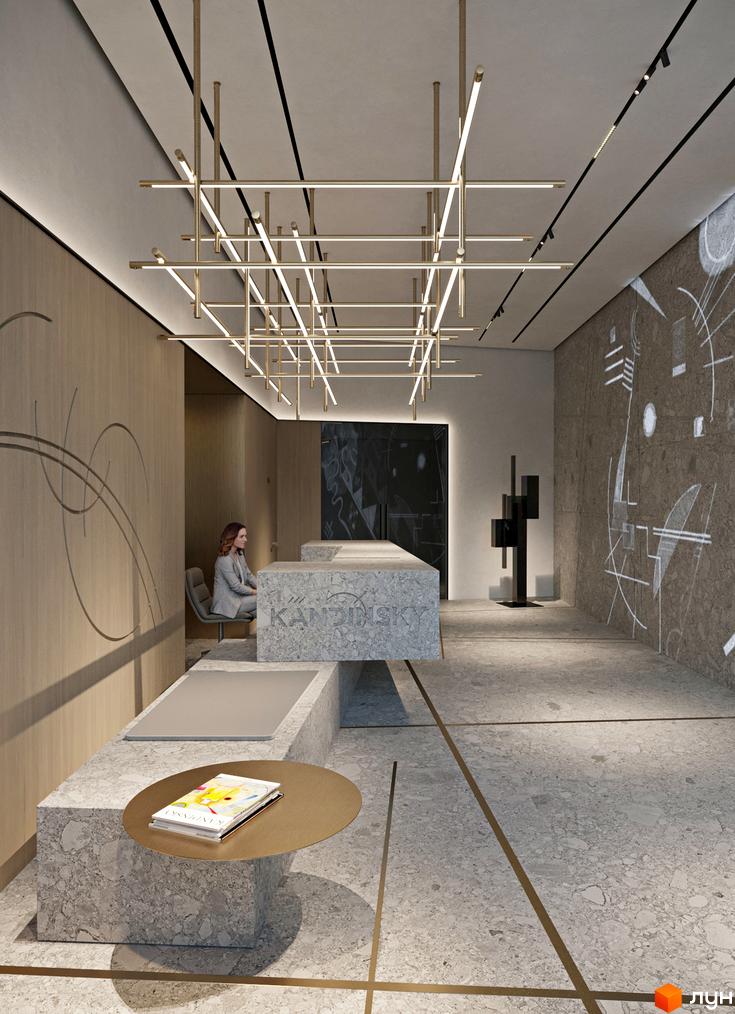 Інтер'єр холу житлового комплексу Kandinsky Odesa Residence. Стіни оздоблені деревом та бетоном. На стелі підвісна система освітлення. На підлозі плитка з вкрапленнями.