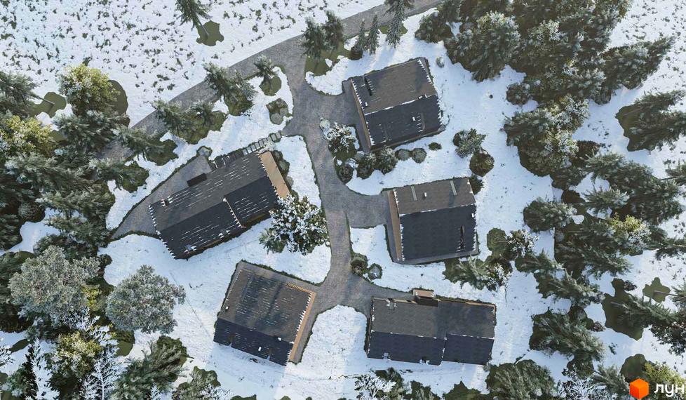 Вид зверху на будинки КМ INO club взимку. Будинки з темними дахами розташовані серед засніжених дерев та доріжок.