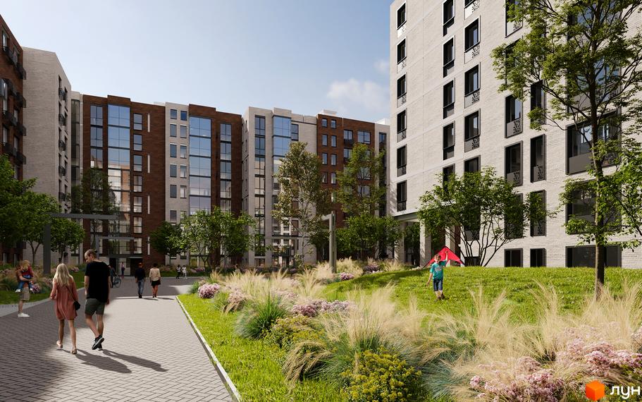 Зовнішній вигляд житлового комплексу Compass з цегляними та білими фасадами, великими вікнами та прибудинковою територією з газоном та деревами. На території грається дитина з червоним повітряним змієм.