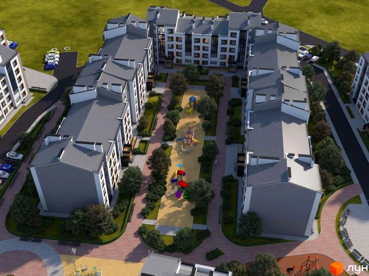 Вид на будівлі ЖК Grand Comfort з висоти пташиного польоту. На території комплексу розташовані дитячі майданчики та зелені насадження.