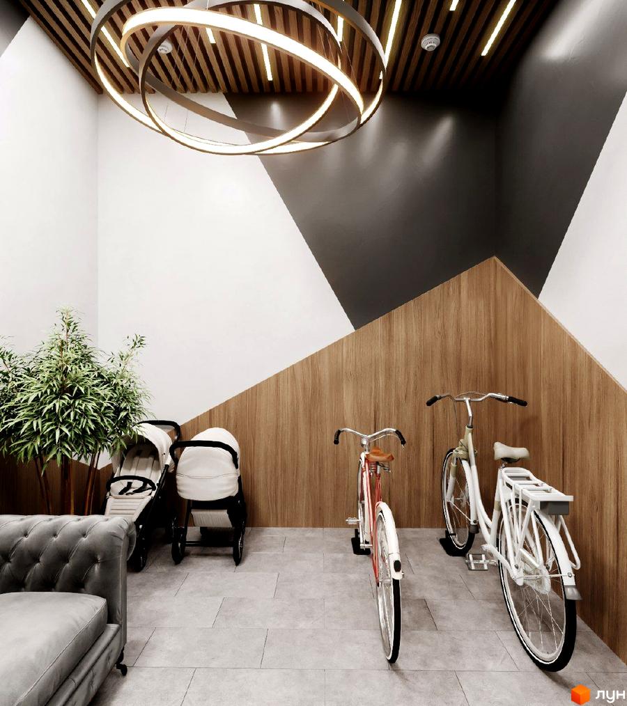 Інтер'єр в ЖК Джем Сіті з диваном, рослиною, дитячими візками та велосипедами. Дизайн холу з дерев'яними панелями та оригінальним освітленням.