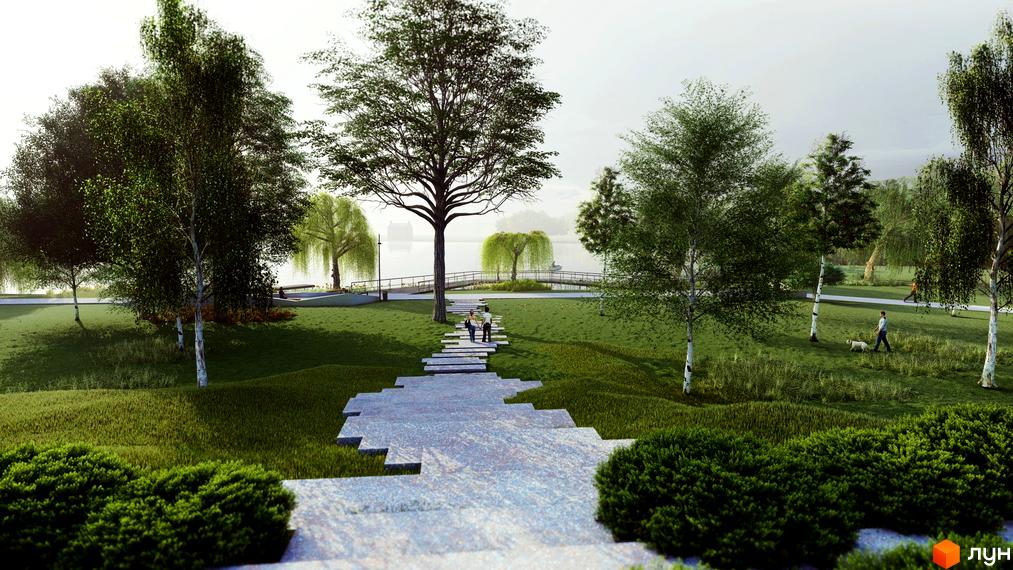 Зелена паркова зона Котеджного містечка Riverside з кам'яними доріжками та різноманітними деревами. Територія розташована біля водойми з пішохідним мостом.