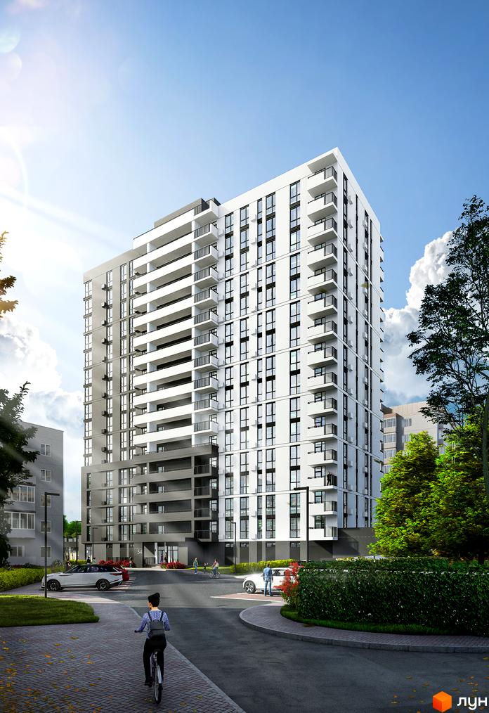 Висотна новобудова ЖК Дім на Янгеля з білими фасадами та балконами. На території комплексу є зелені насадження, тротуар та дорога.