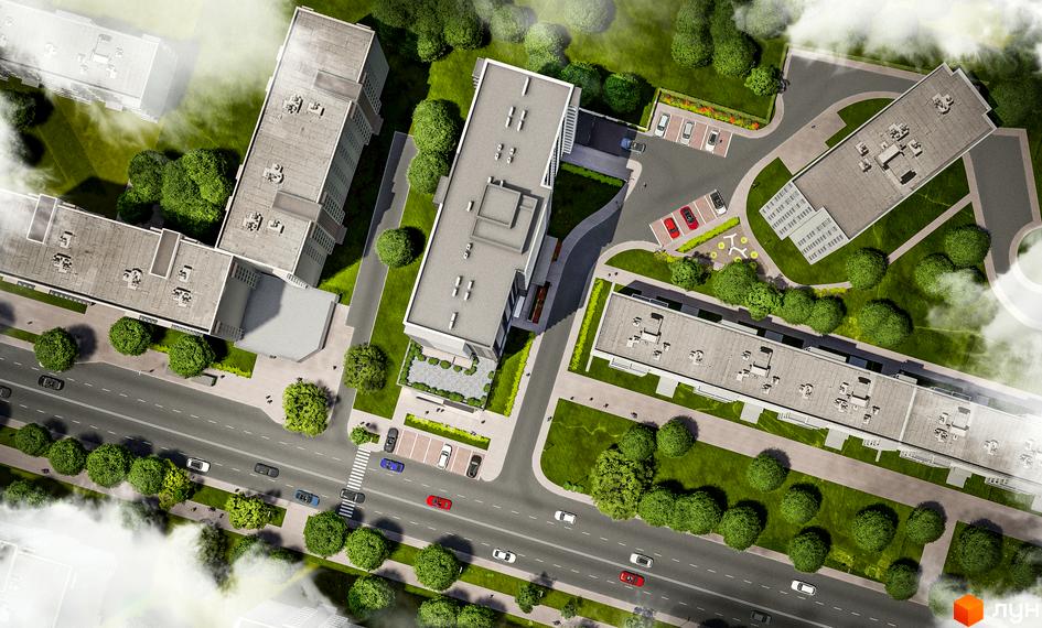 Вид зверху на будівлі Житлового комплексу Дім на Янгеля з парковкою, зеленими насадженнями та дорогою. Архітектура житлового комплексу.