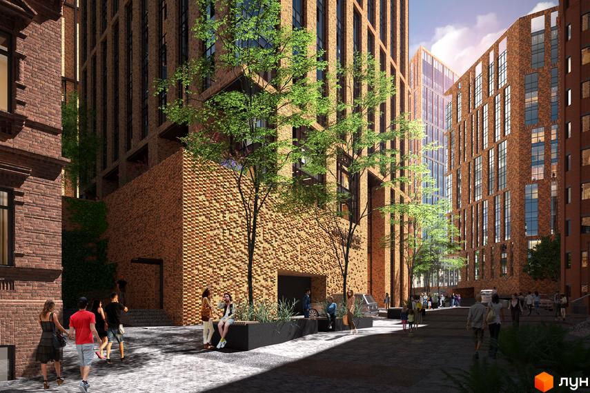 БФК Ermolaev Center - це житловий комплекс з цегляними фасадами та просторою прибудинковою територією, де розташовані дерева та місця для відпочинку.