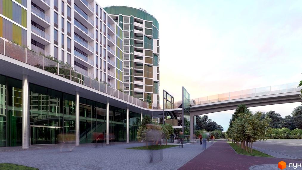 Житловий комплекс Смарагдові вежі з фасадом з білих панелей та кольорових скляних вставок. Навколо комплексу розташована доглянута прибудинкова територія з деревами та пішохідними доріжками.