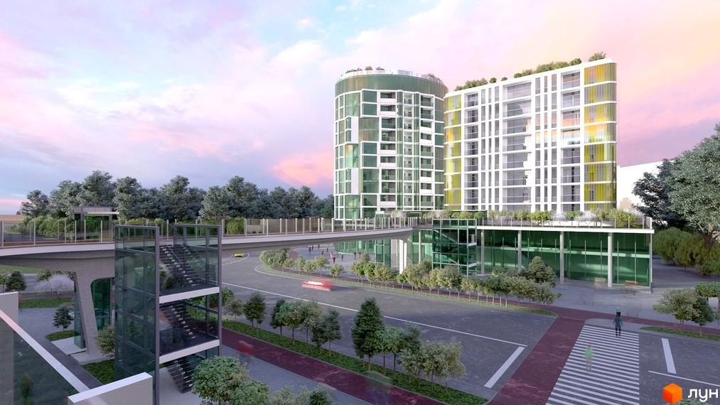 Житловий комплекс Смарагдові вежі з двома вежами та скляним переходом. Навколо зелена територія, дорога та пішохідний перехід.