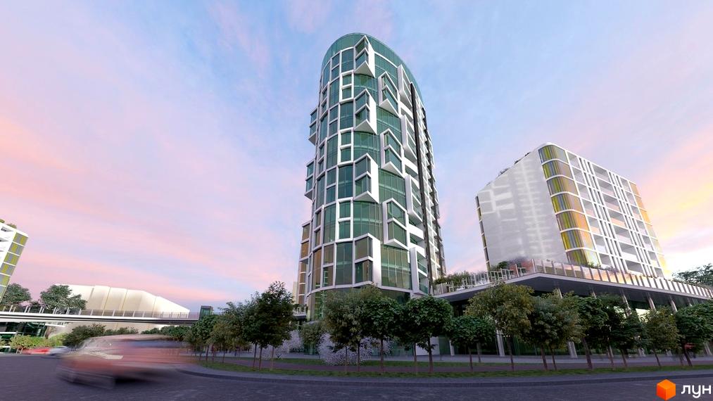Житловий комплекс Смарагдові вежі з незвичайною фасадною системою вікон та балконів. Навколо комплексу розташовані дерева та зелена зона.