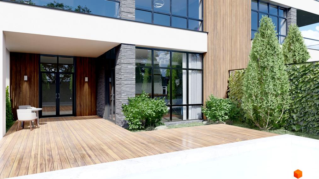 Фасад будинку з дерев'яним оздобленням та великими вікнами. На терасі стоять столики та крісла, поруч зелені насадження.