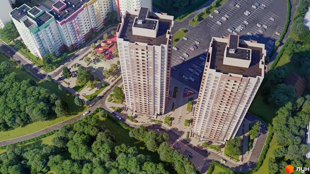 Житловий комплекс Friendly House з висоти пташиного польоту. Сучасна архітектура, багатоповерхові будинки з балконами, упорядкована прибудинкова територія з парковкою та зеленими зонами.