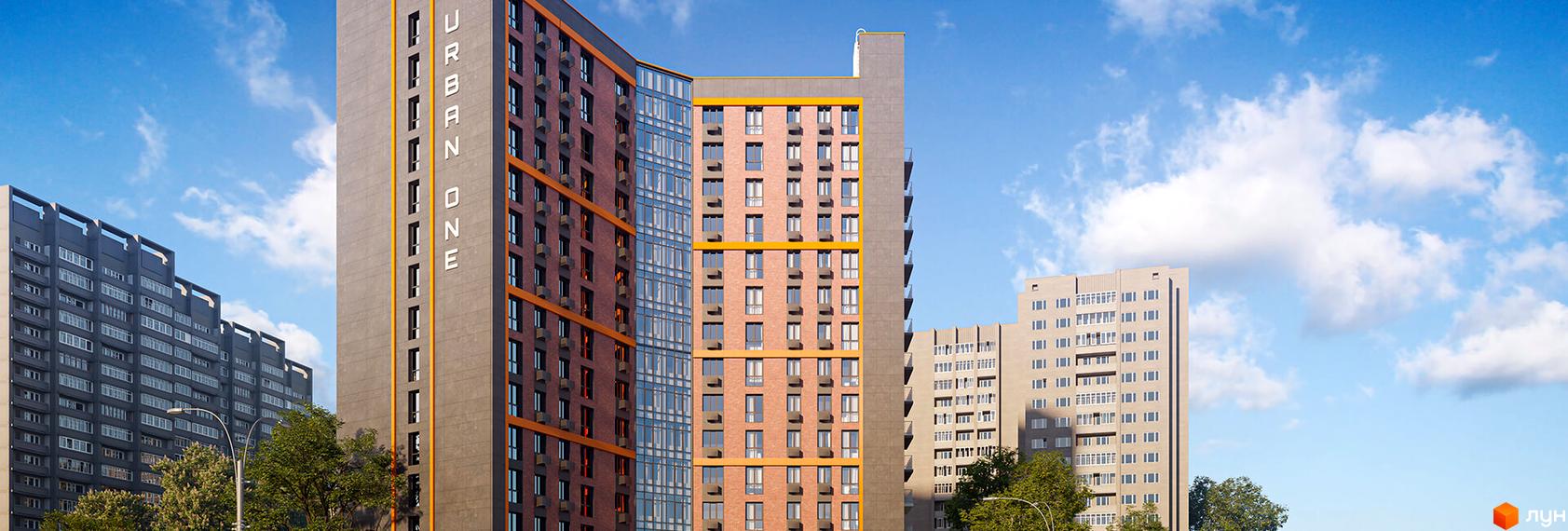 Висотна будівля житлового комплексу Urban One Klochkivska з великою кількістю вікон на фоні блакитного неба з хмарами.