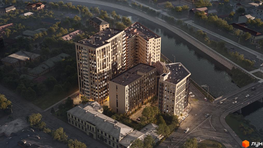 Новобудова IT-Парк Manufactura: високі будинки зі світлими фасадами, розташовані біля річки, мосту та зелені.